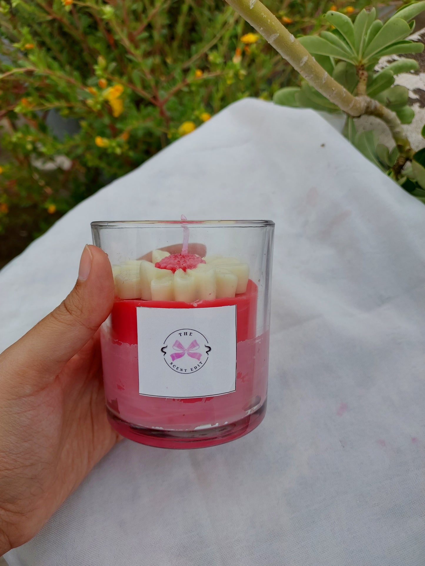 Pink daisy candle floral decor slow burn India